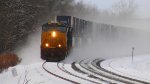 CSX 3142 leads a stack train through the curve at MP 381